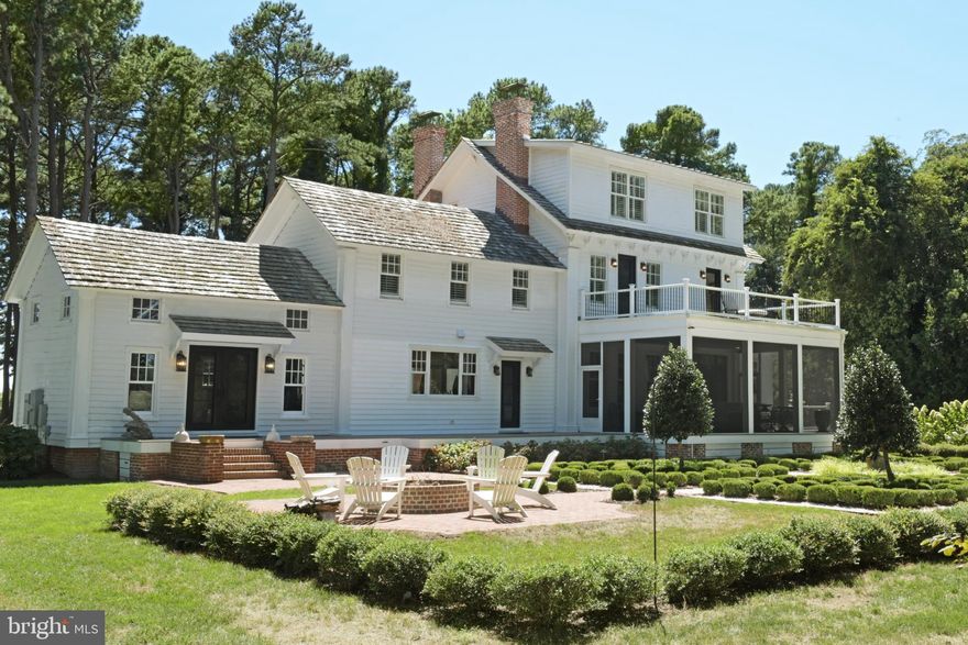 *Mimosa Farm: A Bespoke Waterfront Legacy*An offering of unparalleled distinction, Mimosa Farm represents a rare opportunity to acquire a meticulously restored and totally renovated historic estate. This 17.1-acre waterfront property, boasting over 1,500 feet of natural shoreline, seamlessly combines the charm of its 1850 heritage with the pinnacle of contemporary luxury and convenience. The estate features a grand main house, a versatile carriage house with a complete apartment, and an expansive restored barn with living quarters currently operating as a high-demand event venue, yet ripe for a multitude of bespoke uses.

*Key Features Include*
-5 Bedrooms (3 in Main House, 1 in Carriage House and 1 in Barn/Event Venue),
-5 Full Bathrooms ( 3 in Main House, 1 in Carriage House and  1 in Barn/Event Venue) and
-3 Half Baths ( 1 in Main House, 1 in Carriage House and  in 1 Barn/Event Venue)
-New three-bay garage/carriage house with a second-floor living suite.
-Historic barn built circa 1863, now a five-star rated event venue ("Mimosa Barn").
2,808 square feet of space with a capacity for 300+ guests plus bedroom with water view, 1 and 1/2 bathrooms, kitchenette, sitting area and flex spaces
-RV electric post next to the garage.
-Irrigation system.
-500-gallon propane tank.
-Private125' dock with a boat lift.
-Whole-house generator, water filter, and dehumidifier.
-Main house security system
-Large outdoor fire pit.
-Historic Preservation Tax Credit available 

Nestled within a serene enclave , this exquisite farmhouse-style residence, originally built in 1850 and masterfully renovated in 2019, offers a harmonious blend of historic charm and modern luxury. Spanning 17.16 acres, this property is a true sanctuary, featuring lush landscaping, a partly wooded area, and a tranquil Eyre Hall Creek that meanders at the edge pf the grounds, creating a picturesque backdrop for your everyday life. Step inside to discover an inviting interior that exudes warmth and sophistication.
 
The spacious layout includes three generously sized bedrooms and three and a half elegantly appointed bathrooms in the Main House. The heart of the home is the family room, seamlessly connected to the gourmet kitchen, which boasts high-end appliances including a six-burner gas stove, built-in microwave, and an extra refrigerator/freezer for all your culinary needs.
 
Rich hardwood and marble flooring flow throughout the home, complemented by luxurious finishes such as crown moldings and chair railings. The thoughtful design includes built-ins and a cozy bar area, ideal for hosting gatherings. An elevator provides easy access to all levels, ensuring convenience for everyone. The exterior of the property is equally impressive, showcasing extensive hardscaping, multiple balconies, and a screened patio that invites you to relax and soak in the stunning views of the creek and surrounding parterre gardens.
 
The property also features a Carriage House with space for three vehicles and a charming guest house. Additional outbuildings include Mimosa Barn, which is currently used as a 5 star event venue  perfect for visitors or as a private retreat. 

For those who appreciate an active lifestyle, the property offers private access to the creek, where you can enjoy boating, fishing, kayaking, or simply basking in the beauty of nature. The dock, equipped with an electric hoist, provides easy access for boating enthusiasts. 
Located in a secluded area yet conveniently close to local amenities, this home offers the perfect balance of privacy and accessibility. Experience the exclusive lifestyle that this remarkable property provides, where every detail has been thoughtfully curated to create a haven of comfort and elegance. Embrace the tranquility of nature while enjoying the luxury of modern living in this extraordinary Cape Charles residence.

Living area of 5,612 square feet = Main House + Carriage House Apartment (LL 2) + Living Area of Barn (LL3)