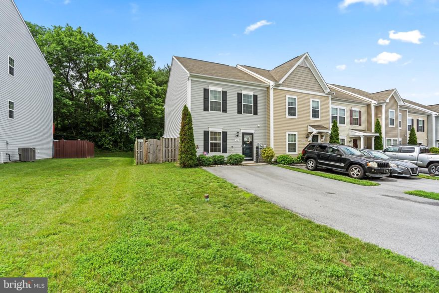 Welcome home to 62 Teakwood Drive! An affordable, end-of-row townhome in the Manor Park community! The home features a yard close to three times the size of it's neighboring homes! Off-street driveway parking for 4 cars is a popular attractive feature of this home, and community.  This home was recently built in 2017, with all large items and mechanicals in great shape! The home features 3 bathrooms, 3 bedrooms, and a sleek and modern kitchen, dining, living rooms. With LOW taxes, LOW HOA dues, and being in a USDA -Eligible area, this home offers the potential to be more affordable than surrounding area homes with the same price! This home won't last long, call to schedule your private tour today!