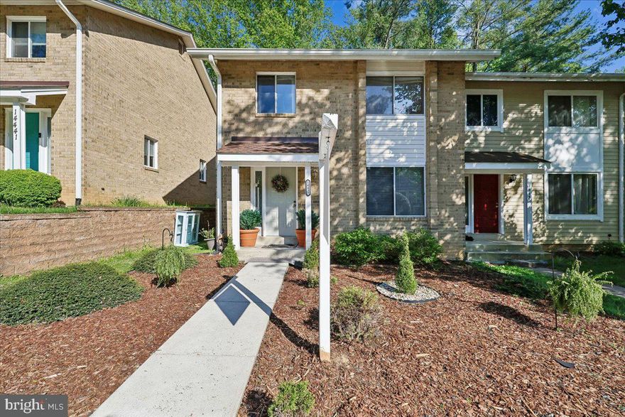 A tranquil retreat in an understated community within the top-ranked Wootton cluster! Perfectly situated backing directly to the serene nature of the MUDDY BRANCH TRAIL, this spectacular, fully updated, move-in-ready END-UNIT townhome is your personal paradise. Inside, gleaming HARDWOOD FLOORS and an elegant staircase with upgraded rails set a welcoming tone, opening to sun-filled living spaces accented by rich CROWN MOLDING and RECESSED LIGHTING throughout. The heart of the main level is a beautifully updated kitchen featuring QUARTZ COUNTERTOPS, a custom tile backsplash, a UNIQUE CENTER ISLAND, a convenient pantry, and a newer refrigerator. Upstairs, rich ENGINEERED WOOD floors span the upper level, which hosts three generously sized bedrooms with large windows that flood the rooms with natural light. The primary suite is a true retreat, boasting HIS-AND-HERS CLOSETS and a jaw-dropping, CUSTOM EN-SUITE MASTER BATH designed for ultimate relaxation with a luxurious JACUZZI TUB. The FULLY FINISHED LOWER LEVEL expands your living options with TWO FLEXIBLE DENS and an additional FULL BATHROOM—creating the ideal space for a home office, gym, or guest suite. Step outside through the upgraded sliding glass door to your private outdoor oasis, where a spacious DECK overlooks a FULLY FENCED-IN YARD featuring a side-door entrance, a storage shed, and a fantastic OUTDOOR KITCHEN setup for effortless entertaining. Offering true turnkey peace of mind, major systems have already been addressed, including a BRAND NEW HVAC (Fall 2025), a 3-YEAR-OLD ROOF, a new sump pump (2023), and replaced rear windows. With an incredibly LOW HOA of just $38/month and CONVENIENT PARKING located directly in front of the unit, this home checks every box. IDEALLY SITUATED, you are just minutes from Travilah Square, Fallsgrove, Rio, Kentlands, Downtown Crown, and major commuter routes including the ICC and I-270.