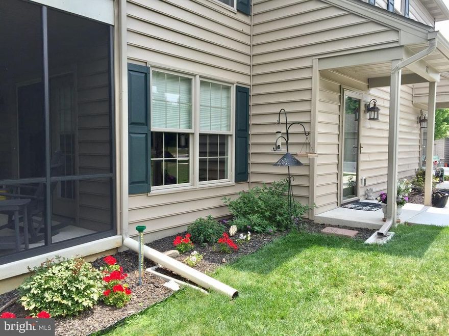 Enjoy carefree living in this first floor ranch style condo. This home was built with endless upgrades. Hardwood floors in kitchen, dining room, and living room, 3 bedrooms, 2 full baths, beautiful finished basement for extra living space and screened in porch. Kinetico drinking water station and electric water conditioner. Rented 1 car garage available also. All appliances stay!