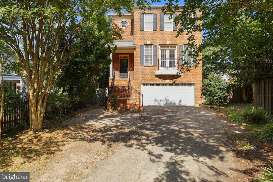 Set back in the corner of a quiet street, 415 N Frederick is the perfect home for a peaceful life yet just minutes walk to the bustling Ballston area. Freshly painted throughout with gleaming re-finished hardwood floors; the huge windows, crown moldings and tall ceilings create a stunning and light living space for the new owner. Stone counters and SS appliances in the kitchen overlooking the deck, and a cozy family room complete with gas fireplace. Upstairs, the master suite boasts a large walk-in closet and en-suite complete with double vanity, stall shower, and soaking tub. 3 more spacious bedrooms on this level along with a full bathroom and convenient laundry room. The fully finished basement has 11' ceilings, a gas fireplace surrounded by a custom built-in bookcase, a full bathroom and egress to the yard. The large fenced rear yard hosts an under-deck patio with hot tub. The 2-car garage houses an additional storage space, and the driveway accommodates parking for plenty of visitors.