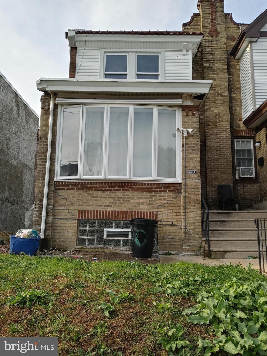 Located in west oak lane. enter into the closed enclosed porch, that lead into the living room, dining room and eat in kitchen that led out to the deck for those summertime cook outs. Upstairs feature three bedrooms and hallway bathroom. lower level has a basement and garage for your off-street parking. make a offer.