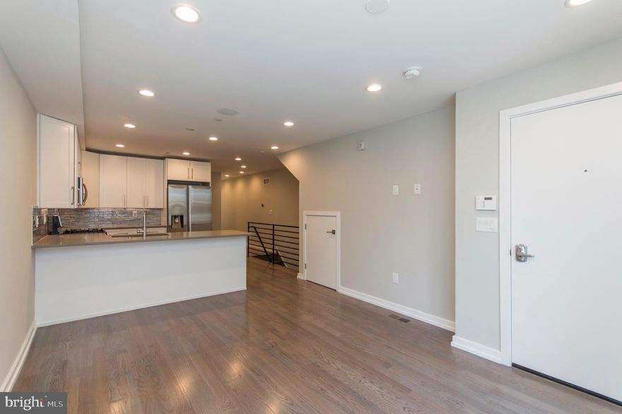 Welcome to Portofino! This stunning building in Graduate Hospital offers luxurious space at a great value. Enter your brand-new home and immediately notice the great natural light from the large windows. Step across the fine hardwood flooring to your modern kitchen, featuring stainless steel Samsung appliances, quartz counter tops with bar seating, and ample cabinet space. NEST Thermostats, hard-wired speakers in the ceiling and outdoor spaces, and Video Intercom to the front entrance are just some of the many features of this condo. Unit 1 features three bedrooms with hardwood flooring, large closets and recessed lighting, and three full bathrooms which offer fantastic tile, a tub, shower and vanity. Unit 1 also has access to a private backyard. Prime Location! This property provides easy access to restaurants, shopping, schools, public transportation and much more. Easily walk to the Center City, the Broad Street Subway, Rittenhouse Square, and the Schuykyll River Trail. Great access to Penn, Drexel, and CHOP. Close to I-76 and I-95 for an easy commute out of the city. Located in the Greenfield Catchment. Don't miss a great opportunity to live in this one of a kind building.