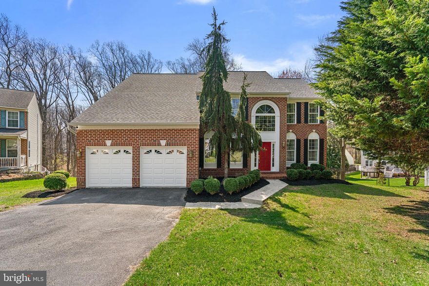 Must-see, two-car garage brick-front colonial on a prime cul-de-sac lot backing to forest conservation w/sparkling stream in sought after Worthington Reserves! Endless improvements by the original owners include: new roof (2019); new Trane gas 2-zone HVAC (2019); gorgeous multi-level composite deck; maintenance-free composite trim; gleaming hardwoods throughout the main and upper levels; tall 9' ceilings; gourmet eat-in kitchen w/42" cabinets, granite counters, upgraded stainless steel appliances including a gas oven/range and slider from breakfast room to rear deck; sunken family room w/warm gas fireplace; separate living and dining rooms with a bright bay window; remodeled 1st floor powder room; French doors lead to the 1st floor office; mudroom off garage has hook ups for 2nd washer/dryer; grand 2-story foyer w/hardwood staircase leads to the upper level w/4 generous sized bedrooms and 2 full bathrooms; primary suite w/soaring cathedral ceilings, sitting room, 2 massive walk-in closets and laundry chute to main level mudroom; absolutely stunning remodeled primary en suite bathroom w/quartz topped double sink vanity, illuminated vanity mirror, glass walk-in shower w/multiple shower heads and pebble floor, HEATED ceramic tile floors, water closet, extra quartz topped built-in cabinets, front loading washer/dryer and tall vaulted ceilings; 2nd full bathroom w/double sinks; full lower level w/walk-out to rear patio and yard; basement rough-in for future bathroom; extensive recessed lighting; invisible fence w/collar and signs; window treatments and exterior security cameras convey; rear windows of home have professional window tint for energy efficiency; double hung tilt-in windows; extensive landscaping. An amazing backyard w/southern exposure providing warmth in the winter, yet shade from the trees in the summer. Zoned for sought after Howard County schools including Worthington ES, Ellicott Mills MS and Howard HS! NO HOA fees!