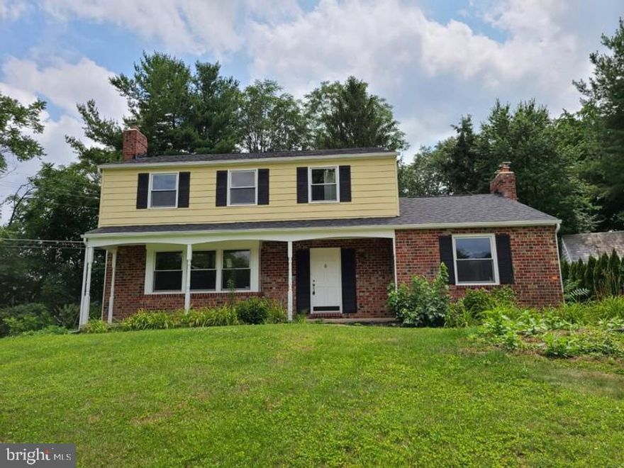 Absolutely charming family home in the sought after neighborhood of Ruxton Ridge.  Recently renovated and ready for new owners, this classic beauty with its fresh paint and refinished hardwood floors features an enormous family and living rooms with brick fireplace, nice sized formal dining room that leads to an updated kitchen with granite  counter-tops, ceramic tile floor and new stainless steel appliances, spacious  bedrooms in upper level with en suite bath in master bedroom, full basement that is mostly finished with large recreation room and 2 additional rooms that are potential as bedrooms or den.  The extensive yard and long driveway makes this home complete.  Great location - near Towson Town Center,  universities/colleges and hospital.