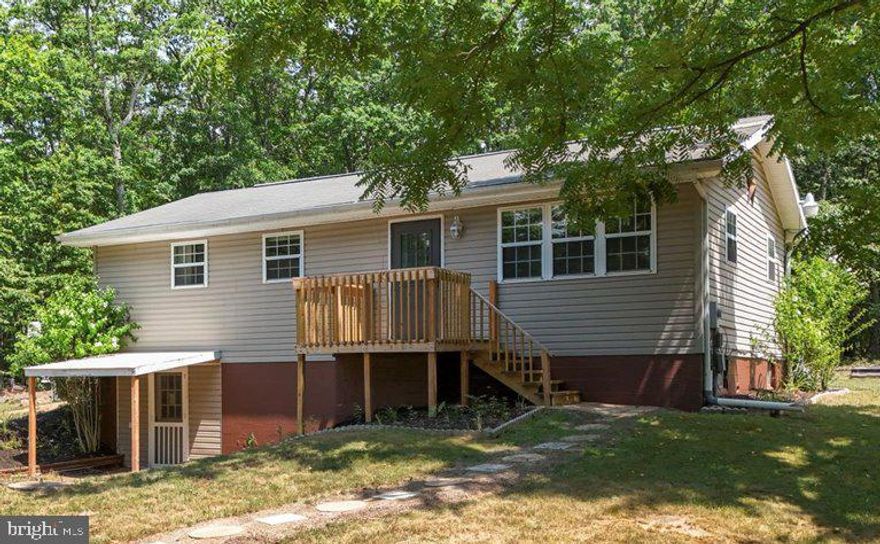 Looking for a fresh, updated home situated on a spacious and private lot that’s ready for you to move right in? Look no further—this home has it all!  It’s the only home in Allegany County with space for five bedrooms on this size lot at this price point!  There are three bedrooms on the main level and two more rooms with closets downstairs, immediately suited for use as bedrooms, so this property offers ample space for your family and guests. Exterior updates include newer siding and a charming front porch, inviting you to step inside and discover the refreshed interior. You'll find newer flooring, light fixtures, kitchen countertops, painted cabinets, newer appliances, and an updated bathroom vanity, ensuring every corner of the home feels up to date. Essential updates like the well pressure tank, well pump, hot water heater, siding, windows, and HVAC system provide peace of mind you wont have to face high costs of replacement in the near future. The main level features three bedrooms, full bath, living room and spacious eat-in kitchen that walks out to a private screened porch, perfect for relaxing and enjoying nothing but the sounds of nature surrounding you.  The screened porch looks out to the landscaped walkway leading to multiple sheds, buildings and a carport for all your storage needs on this 1.24 acre lot.  Surrounded by mature trees, this beautiful property offers a serene and private retreat. Plus, it’s within walking distance to Warrior Mountain Wildlife Management Area, offering over 5,000 acres of public land for nature lovers, hikers, and hunters to explore.  Also situated within a few miles of the C & O Canal.  Don't miss this opportunity to own a slice of paradise that combines modern living with the beauty of nature.