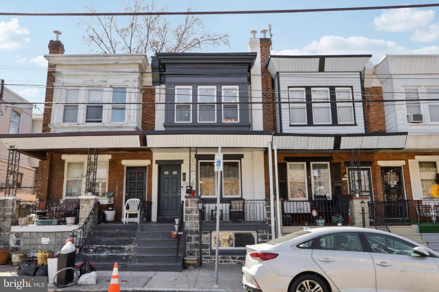 Welcome to this fully updated rowhome in the highly sought-after neighborhood of Brewerytown, offering both style and convenience with 4 years left on the tax abatement! Enter from the charming covered front porch that overlooks the public swimming pool, into an open-concept floor plan that feels bright and airy. Gleaming hardwood floors and an exposed brick wall add to the home's unique charm, seamlessly blending classic character with modern upgrades. The spacious living room flows effortlessly into the dining area, which opens directly into the beautifully designed kitchen. The chef's kitchen boasts stunning Quartz countertops, sleek stainless steel appliances, gas cooking, a stylish tile backsplash, and a breakfast bar perfect for casual dining or entertaining. A door from the kitchen leads to the private rear patio, complete with built-in garden beds -- ideal for outdoor relaxation and gardening. Upstairs, you'll find three well-appointed bedrooms, including the front primary suite with a wall of windows that bathe the room in natural light. The primary bedroom also features an ensuite bathroom with a stall shower. The two secondary bedrooms share a full hall bathroom, making this layout both functional and comfortable. The full finished basement adds tremendous value, providing flexible space to suit your needs -- whether you envision a home office, gym or cozy lounge. Plus for added convenience, there's a dedicated laundry room complete with a high end Samsung washer and dryer. Some upgrades include high end and easy to use custom blinds on all windows and Elfa shelving in all closets to maximize closet space and elevate your home organization. Located directly across from the public swimming pool and athletic park, this home offers unbeatable access to outdoor recreation. Street parking is plentiful and hassle-free, ensuring that convenience is always at your doorstep. The beautifully updated home combines modern amenities with a prime location, offering you the best of Brewerytown living. Don't miss out -- schedule your showing today!