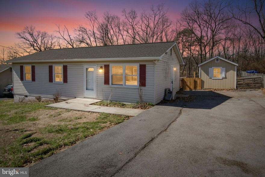 REDUCED! This charming ranch-style home offers a perfect blend of comfort and functionality. Close to the VA center. The inviting interior features three cozy bedrooms and a full bathroom complete with a jetted tub for relaxation. Enjoy the convenience of main-floor laundry, making daily chores a breeze. Step outside to discover a lovely deck, ideal for morning coffee or evening relaxation. The exterior includes a shed for extra storage. The level lot backs onto an open common area, providing a serene backdrop for outdoor activities. Back yard is Crossed Fenced for a Run area for al of your Critters. With off-street parking  and a welcoming front yard, this home is ready to embrace new memories. Experience the warmth and charm of this delightful property, where every detail invites you to settle in and feel at home. New roof, gutters and down spouts in 2024.