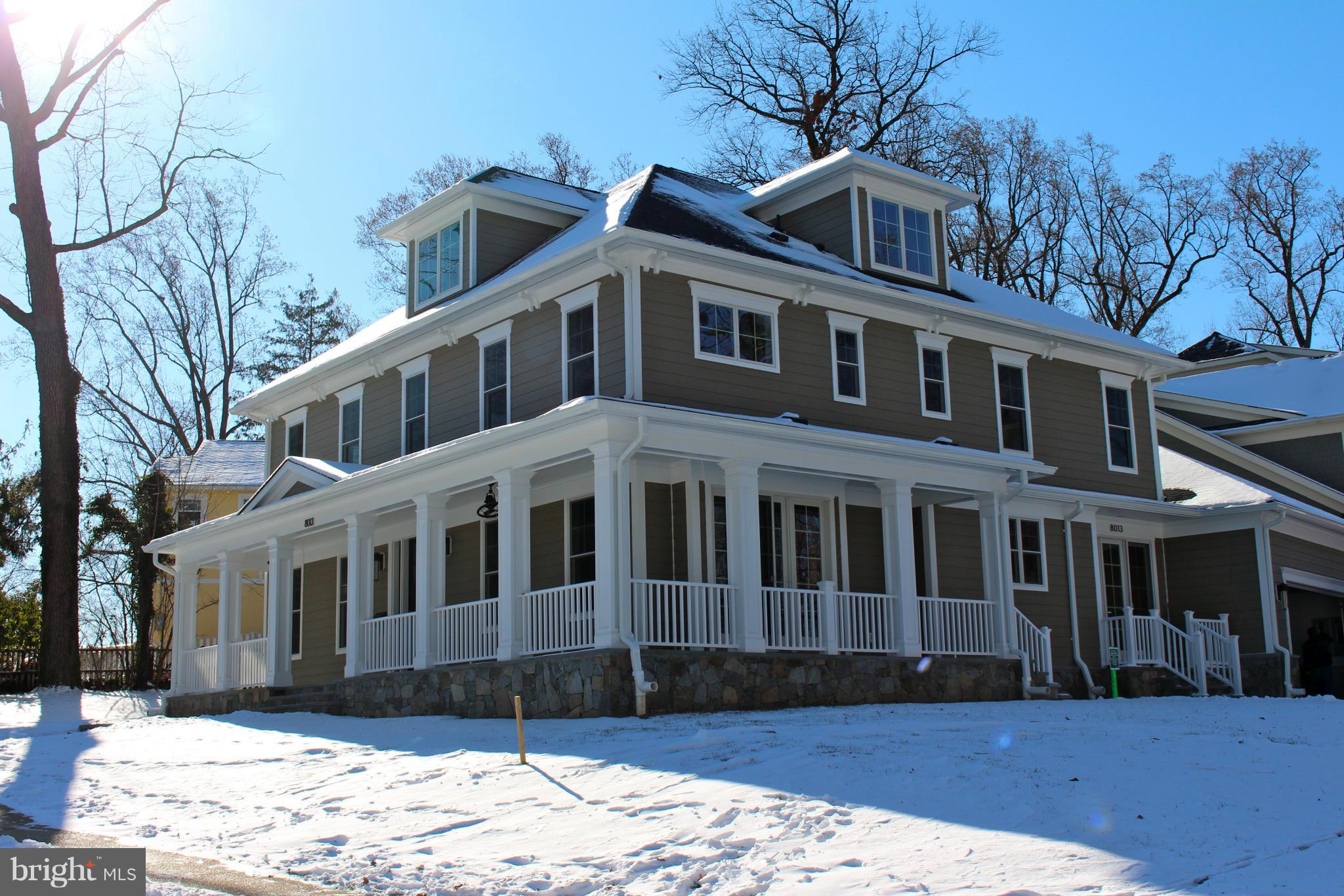 This lovely home was built by Washington Metropolitan Homes. Originally a spec house, a buyer purchased the property early in the construction process and was able to customize cabinetry, fixtures and finishes to suit their taste. The home has approximately 5800 sf on four finished levels and features a gourmet kitchen, hardwood floors on main level, wrap porch, flagstone patio and generator.