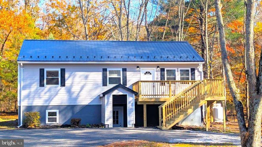 New Lower Price! Priced to sell fast. Beautiful home on TEN (10+) acres currently approved for Adams County 'clean and green' for forestry land with reduced taxes. Tucked away into the woods with a new paved driveway completely rehabed inside and out. The home features a spacious living area with 4 full bedrooms and 2 bathrooms, office and laundry space. Upgrades include a new roof, new HVAC, new siding, new decks and back patio to enjoy nature’s views, and many interior upgrades such as lighting, flooring, and fresh paint throughout which ensures low maintenance for years to come. Outside, a large garage offers room for equipment, workshop, storage, and more. The land includes open space, and a stream, creating a peaceful retreat ideal for recreation or raising animals. Deer and turkeys regularly visit. Tucked away for privacy yet just a short drive to town, this unique property is perfect for those seeking a hobby farm or a quiet lifestyle surrounded by nature. Make sure you schedule to see this awesome property!