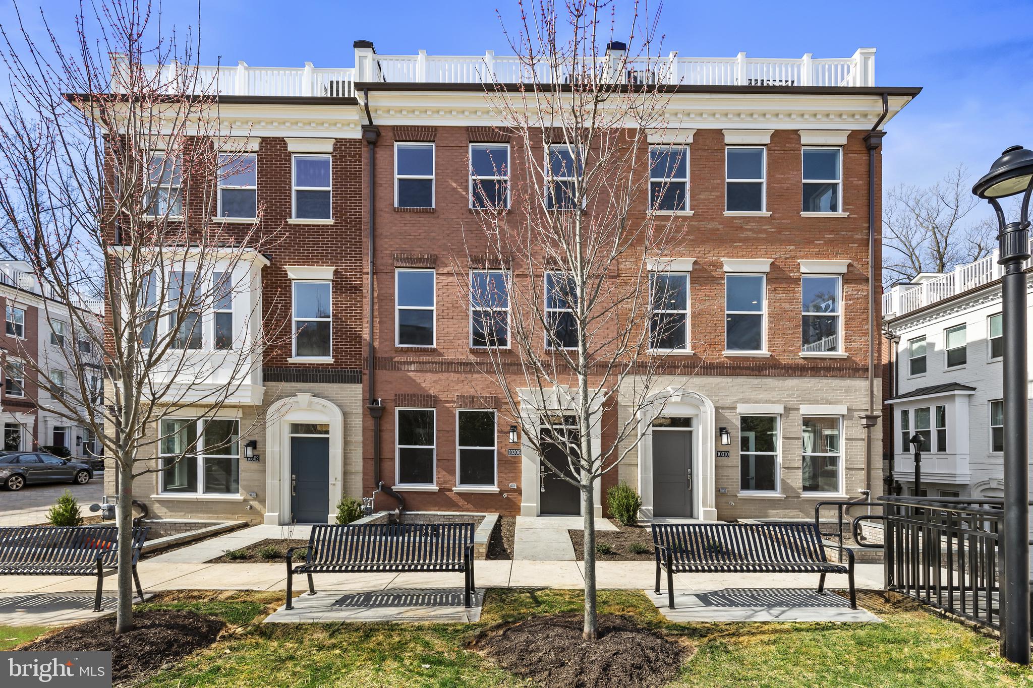 FINAL CLOSE OUT! ONE OF THE LAST REMAINING END UNIT HOMES! DON'T MISS THE OPPORTUNITY TO OWN THIS BEAUTIFUL ELEVATOR MODEL HOME! Only 4 BRAND NEW ELEVATOR TOWNHOMES remain, located in Grosvenor Park/North Bethesda. Located in Grosvenor Park/North Bethesda. Sales Information and Model Home Open Saturday - Sunday 12 pm to 4 PM or by Appointment
Finding your new home in today's market can be very nerve-racking and frustrating, especially in the D.C. Metro area. Competing offers. Escalation clauses. Settling for what a home has instead of getting a home with what you want. What if you could have your choice of newly constructed homes with contemporary finishes and floor plans, and could escape the stress and challenges of a limited inventory market? Come visit our decorated model townhome and see what makes our homes so special.
Inside this gorgeous home, you will instantly feel the openness as you walk across the wide-plank flooring and marvel at the 9' ceilings on each of the four levels. On the main level, you'll appreciate a chef-inspired kitchen which includes 42" cabinets, soft close drawers and doors, under cabinet lighting, microbe-resistant quartz countertops. ceramic tile backsplash, stainless steel appliances, and an island with an eat-in bar. The main level living area is open and spacious with the kitchen towards the rear of the home that flows into the dining room & living room. The home is filled with plenty of natural sunlight and is very bright, floor-to-ceiling windows and sliding glass doors which lead to your rear deck. Each of the bedrooms come with an en-suite bath, including 12 x 24 Carrara Porcelain Floor tiles, quartz countertops, and a spacious closet. The expansive loft living level and outdoor terrace will provide extra privacy and comfort while taking in the fresh air and Vitamin D. Energy Efficient/Smart Home features such as tankless water heater, dual zone heating & cooling system, Honeywell Smart thermostat, and home security system are other key features included in this new home along with so much more!
Spectacular location which is close proximity to the Grosvenor Strathmore Metro Center, Strathmore Music Center, Grosvenor Market, Rock Creek Trail, Bethesda Trolley Trail, & Wildwood Shopping Center. Minutes to Bethesda Row, Pike & Rose, I-495 & I-270. Images for illustrative purposes only.
*Sales price of $1,348,816.00 is calculated by applying the Builder's advertised promotion of $60,000 to the current list price of $1,408,816.00. In lieu of applying the incentive to the list price, the advertised incentive may be used at buyer's discretion towards closing costs, including but not limited to rate buy-down. Pricing and promotions subject to change without notice. ** Photos are of model home.