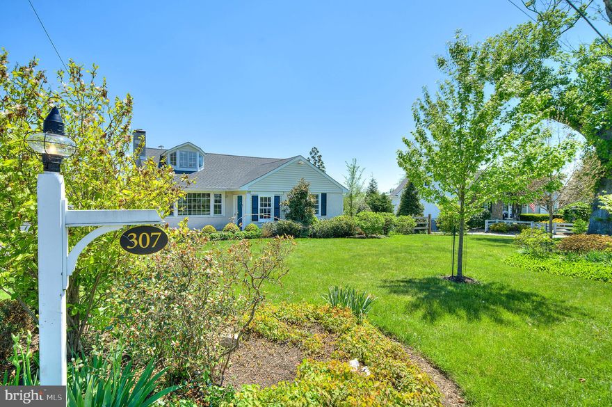This lovely Potts built Cape Cod is located in the heart of  Elliger Park, well loved as one  of  the most popular locations for Buyers.  If you are looking for a quietly beautiful and walkable neighborhood but need easy access to public transportation, parks, shops and entertainment, then look no further than 307 Washington Lane!  Prefer award winning schools?  This home is in the National Blue Ribbon of Excellence winning Upper Dublin School District.   With 4 Bedrooms, 3 Full Baths and an attached 2 Car Garage, this home provides wonderful spaces for comfortable family living.  The Foyer opens to a large Living Room flooded with natural light. Updated Kitchen (2022) features marble counters, white cabinetry, tile backsplash and stainless steel appliances.  The large Dining Room is highlighted by abundant light and a door to  the sunny rear deck, perfect for indoor/outdoor dining.  First floor has 2 Bedrooms, 2 Full Baths and Laundry.  Primary Bedroom has updated adjoining Primary Bathroom. 
2nd Floor offers 2 Bedrooms, updated Full Bathroom.   Hardwood floors throughout both first and second floors.  The Partial Basement is fully insulated and water proofed with auxiliary washer/dryer and water softener.  A  large crawl space area offers extra storage.  Separate electrical box for connecting to a portable generator.   New Roof - 2022, HVAC - 2022, Hot Water Heater - 2022.  
   The charming town of Ambler is just blocks away.  Enjoy the shops, restaurants, and Ambler Movie Theatre.  Or you can walk to Washington State Park and enjoy a day outside.  Access to Ft. Washington train station is less than 1 mile away for a short train ride into Philadelphia.   Elliger Park is located minutes from Rt. 309, PA Turnpike and Blue Rt. to  the airport.   Walking distance to the award winning Upper Dublin schools.