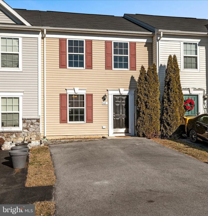 Move-in-ready home with modern updates throughout. Entry opens to a bright living area with a convenient half bath, leading into the kitchen and dining space with access to a fully fenced backyard. Upstairs features three bedrooms and two full baths, including a primary suite with tub/shower en-suite. Two additional bedrooms share a full bath. Upper-level washer and dryer for added convenience. Recent updates include fresh paint and new LVP flooring and carpet throughout, new dishwasher, new washer and dryer, new mirrors, updated trim, and a new island countertop.