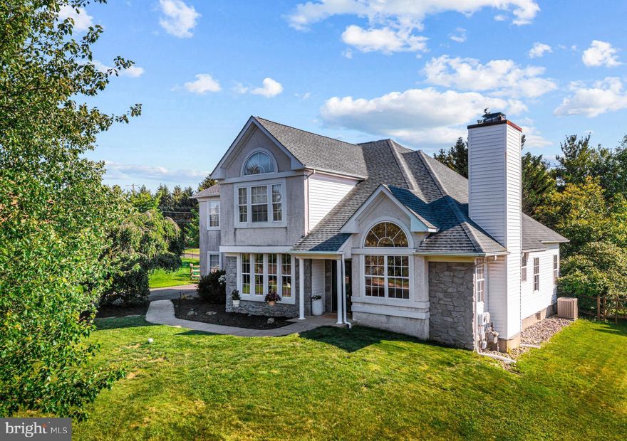 Welcome to 1720 Hampton Dr, a spacious and thoughtfully designed home. Nestled in a desirable neighborhood, this home offers 4 bedrooms, 3 full baths, 2 half baths, a finished basement, and an in-ground pool. At the heart of the home, the open-concept kitchen boasts hardwood flooring, a large pantry, and a peninsula with seating—perfect for casual meals or entertaining- with sliding doors out to the deck. The kitchen flows seamlessly into a sun-filled breakfast room and the family room with vaulted ceilings, all with views of the expansive rear deck, mature trees and pool area. A French door off the breakfast area also gives additional access to the rear yard and pool area. Back inside, enjoy the two-story foyer with hardwood floors and a dramatic staircase featuring brand new carpeting. The main level also offers a living room with a wood-burning fireplace, a formal dining room bathed in natural light, a convenient powder room, a home office/den and a laundry/mudroom with direct access to the attached garage. Upstairs, the primary suite features a tray ceiling, separate sitting area and an oversized walk-in closet. The well appointed  bathroom includes dual sinks and makeup vanity area with seating, a soaking tub, glass-enclosed shower, and a private water closet. Three additional bedrooms share the hall bath, each offering generous closets. The finished lower level adds significant living space with a custom bar, gas fireplace, half bath, and multiple areas ideal for entertaining, exercising, or working from home.  There is also a separate storage space for those extra not needed for everyday living. Major updates include Roof, HVAC system, and water heater, all replaced in 2021 to help to provide peace of mind for years to come along with new carpeting on stairs and  the hallway along with new paint through some of the first floor.
Also noteworthy- Originally the home was built as a 5-bedroom with a full in-law suite on the main floor, this flexible layout still includes what was the previous 5th bedroom and is now being used as a home office/den with closet, a full bathroom, and a sun-filled sitting room that is now being used as a separate breakfast room. All can easily be converted back to a private guest or multi-generational suite if needed.
With its versatile floor plan, side entry garage with extensive driveway for 5 or so cars, in-ground pool and and an abundance of living spaces, this home offers the ideal blend of comfort, functionality and lifestyle.