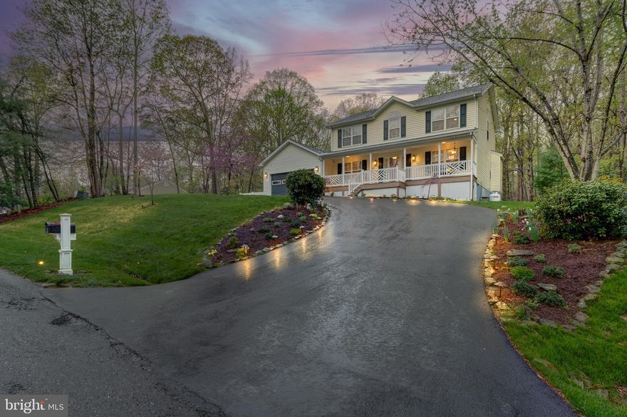 Experience small town charm at its finest! This beautiful MOVE-IN READY, 4 bedroom, 2.5 bath home is nestled in a quiet neighborhood just 5 mins from grocery, dining, & shopping! The home sits on a large, private, wooded & rear-fenced lot with paved driveway, wired landscape lighting, an attached 2-car garage & detached storage shed. Relax through the seasons on the fully-covered, full length front porch with Trex decking. So many recent updates including; brand NEW roof in 2023, all NEW vinyl fencing around the rear yard in 2023, NEW engineered hardwood in 2021 (1st level), HVAC system: One replaced in 2020 & the second HVAC system replaced in 2021, gutter guard installed all around in 2020, the kitchen was remodeled in 2021, & the full hall bath has new fixtures. The crawl space has a full vapor barrier & dehumidifier & there's a separate fully encapsulated crawl space for the addition. Enter in the foyer with plenty of natural light from the side-lighted front door & step into the formal dining room with gorgeous chandelier. The modern kitchen features Quartz countertops with dining peninsula, wood cabinets, garbage disposal, tile backsplash, gas cooking, Samsung fridge, beautiful pendant light over the double sink, pantry & laundry closet. The kitchen is open to the family room with cozy gas fireplace to snuggle around. The bonus dining room addition off the kitchen features gorgeous wainscotting, backyard access & bay windows overlooking the huge fenced back yard, perfect for your pets to run free! Enjoy the rich feel of Berber carpet throughout the 2nd floor. The primary bedroom is well appointed with lighted ceiling fan, walk in closet, & full en-suite bath with newer vinyl shower with glass enclosure, built-in shelving for linens & double vanity. This home is a MUST-SEE with so many features & updates-don't miss your chance to call this quiet oasis home!