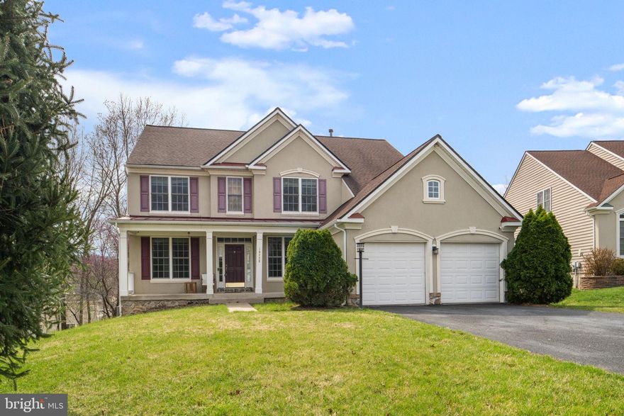 Thoughtfully refreshed with brand-new carpet and interior paint throughout, this elegant Colonial in the Potomac Crest community offers three finished levels of well-designed living space.  Built in 2006, the home features a bright and open main level with hardwood flooring, a welcoming foyer, formal dining room, and a spacious family room with a gas fireplace. The kitchen includes stainless steel appliances, a double wall oven, downdraft cooktop, center island, and a sunlit eat-in area.  Upstairs, the primary suite includes a walk-in closet and an en-suite bathroom with soaking tub, dual vanities, and a separate glass-enclosed shower. Three additional bedrooms provide flexible space for guests, home office use, or additional living needs.  The partially finished walkout basement offers additional living space suitable for recreation, a fitness area, workspace, or entertainment use.  Outdoor features include a large deck overlooking the backyard and an attached two-car garage. The property also includes a security system with exterior cameras.  Conveniently located near Marine Corps Base Quantico with convenient access to Interstate 95 and U.S. Route 1, providing access to shopping, dining, and regional commuting routes. This is the one!