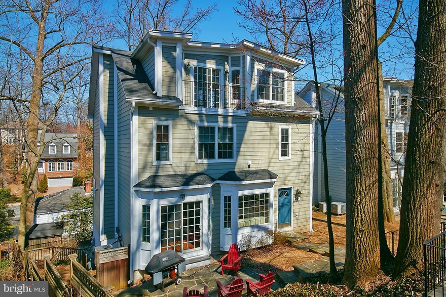 Worth getting excited about! Urban living amidst the trees! Conveniently located just minutes to DC this stylish floorplan is packed with amenities for today's lifestyle  Gourmet kitchen opens to casual dining & family room w/ Gas FP or formal dining room too that opens to G'Town style patio w/stone walls/Roomy Master suite/spa bath/ upper level home office/guest space. 2 car garage/workshop.