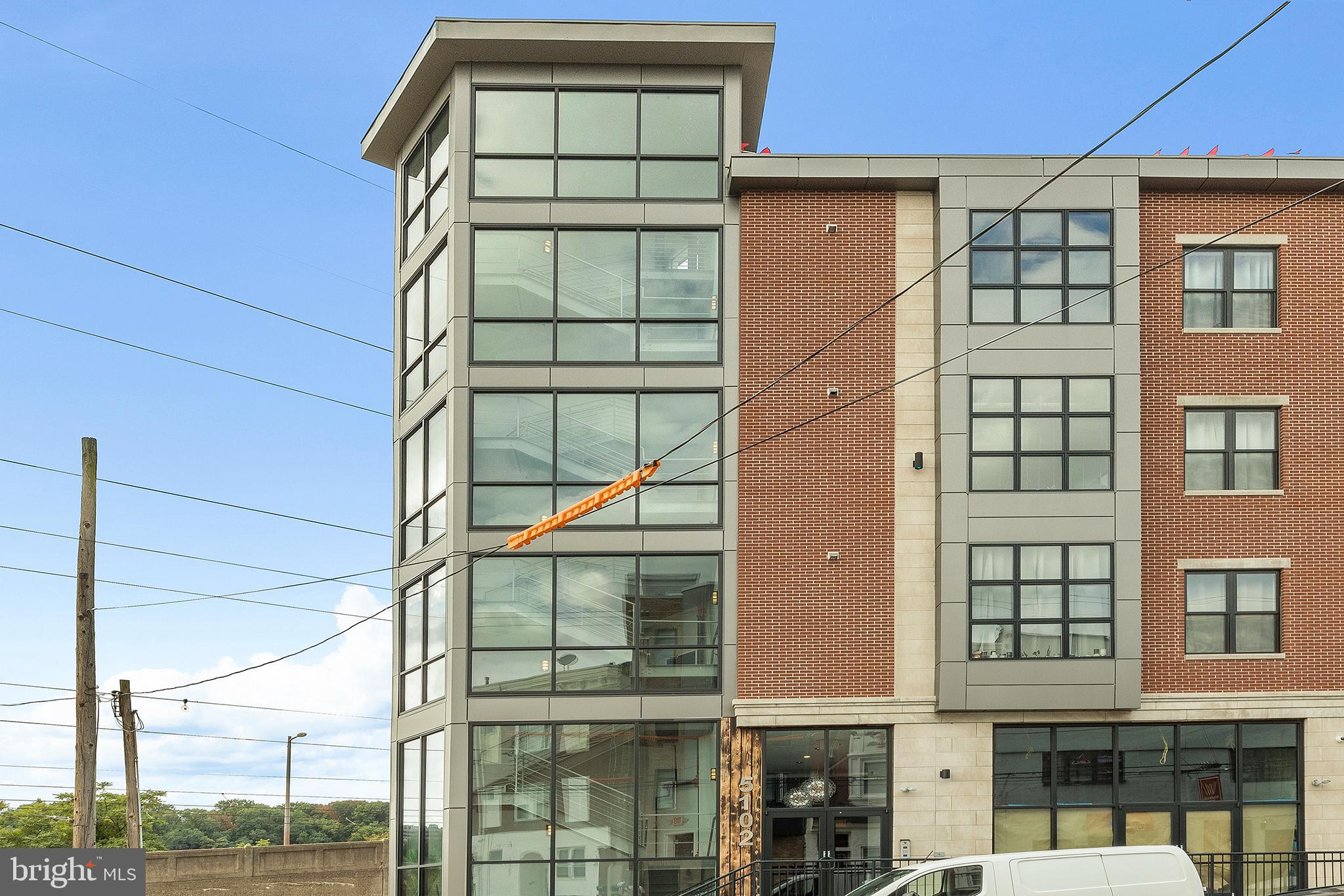 Welcome to the Bentley Apartments. Living in a newer construction luxury building in one of Philadelphia's most vibrant neighborhoods doesn't get any better than this! This beautiful newer construction building, was completed in 2020, features high-end finishes throughout, natural light, high ceilings, a roof deck, elevator, multiple gyms, and parking. Each unit has hardwood floors, designer backsplash and tile, beautiful cabinets, quartz countertops, stainless steel appliances, washer and dryer, central air, and huge windows to flood your home with natural light. Each floor has its own mini gym featuring cardio equipment. The roof deck has breathtaking 360 degree views, including views of the Schuylkill River and downtown Philadelphia. The Wissahickon train station is just steps away making commuting and weekend trips a breeze. The ground floor will include a coffee shop. Less than a mile away is Main Street Manayunk, lined with restaurants, breweries, bars, and local shops. Just down the street is an entrance to the Wissahickon Park for hiking, biking, and dog walking.