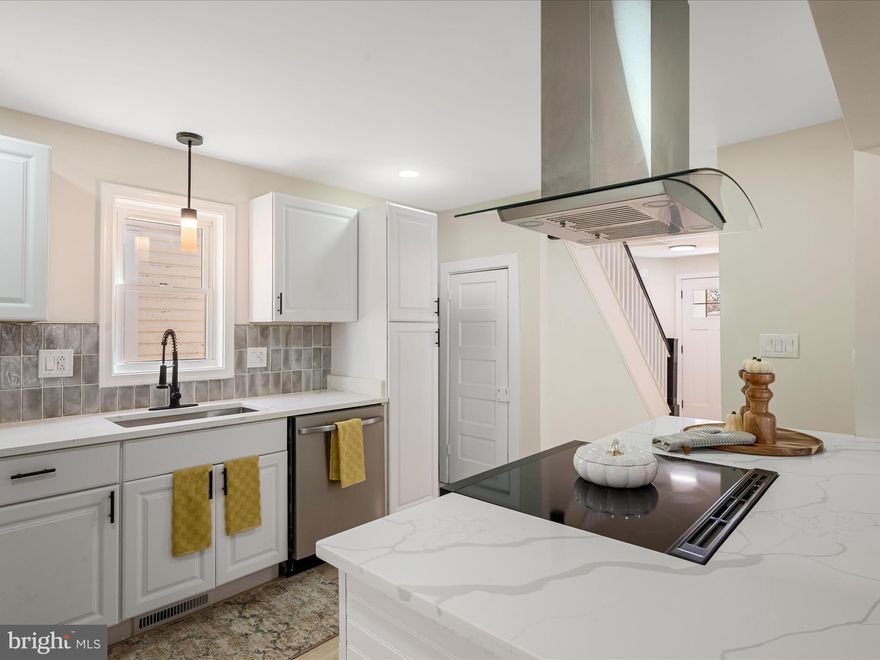 Back on the Market through no fault of the sellers! Discover this beautifully renovated 3-bedroom, 2-bath detached home, ideally located in downtown Martinsburg. The newly designed open floor plan features a stunning kitchen complete with modern cabinets, high-end appliances, and elegant granite countertops. On the main level, you’ll find a spacious living room, a cozy dining area, a full bath, and a convenient laundry room. Step outside to a large, covered patio that overlooks a generous backyard, perfect for outdoor gatherings. Upstairs, the home boasts three surprisingly spacious bedrooms, all adorned with new carpet and ample natural light from numerous new windows. The tasteful neutral decor offers a blank canvas for you to add your personal touches. Recent upgrades include LVP and ceramic tile flooring throughout, a durable metal roof and a brand-new HVAC system, ensuring comfort and reliability year-round. Don’t miss your chance to make this luxurious, newly renovated home on W. Stephen Street your own!