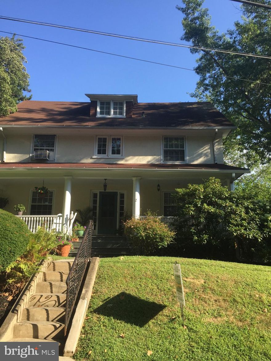 Do not miss your Ultra-rare opportunity to own a truly cherished and gracious three-story Stately Center Hall Colonial with a sun-drenched southern exposure  in the HEART OF NARBERTH. Rich with history, warmth, and timeless elegance, this exceptional 5-bedroom, 2.5-bath residence has been lovingly maintained by its current owners for the last 10+ years and offers extraordinary original craftsmanship seldom found today — soaring ceilings, a dramatic flared staircase with windowed landing, original hardwood floors, artisan built-ins, deep-set windows, exquisite moldings, wainscoting, wide baseboards, crystal doorknobs, and beautiful circular flow designed for both everyday living and memorable entertaining.  Great curb appeal from the street leads to a fabulous covered front porch that welcomes you into a grand center hall foyer, setting the tone for the Sun-Drenched Interior!  The oversized living room with gas fireplace and custom built-ins, elegant formal dining room, cozy office, and updated kitchen with stainless steel appliances blend classic charm with modern comfort. A pantry/mudroom, powder room, and access to the private fenced rear yard—with hot tub and wonderful space for al fresco dining and family gatherings—create a home that feels as inviting outside as it does within. An attached garage and private driveway add rare convenience. The second and third floors offer five spacious bedrooms, including a LARGE primary suite w/ double closets, walls of wIndows and updated Vintage tiled hall bath and an additional bath on the 3rd floor w/ the original classic clawfoot soaking tub that feels lifted from another era. The unfinished basement provides abundant storage and exciting future potential for a playroom, gym or movie room.  Move right in and enjoy this beautiful home exactly as it is, or bring your vision and personal touches to make it uniquely yours — the bones, scale, and architectural integrity here are extraordinary and ready for whatever dreams you have in mind.  Set on a coveted sidewalk street this is a rare chance to own a true single-family home just moments from Narberth Park, the library, boutiques, restaurants, and the R5 train to Center City, all within the award-winning Lower Merion School District. The current owners have treasured and cared for this special home creating countless memories within these walls. Now they're ready to pass along this wonderful opportunity to new owners who will continue the tradition of love and laughter that makes a house truly feel like home.  Don't miss this rare opportunity to own a piece of Narberth's charm!