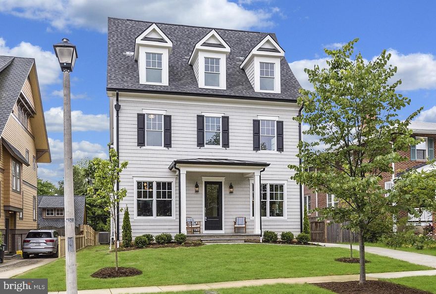 Now Complete! Situated two blocks from Clarendon's Whole Foods and Market Common on one of Lyon Village's most prized tree-lined streets, is this stunning Coastal Classic by Brush Arbor Homes. The award-winning builder has crafted a modern gem in the coveted historic neighborhood, with elevator shaft to all levels and a detached one car garage. This refined 6000 SF+/- home offers an unparalleled standard of luxury urban living with 4 stories, 6 bedrooms, 5 full and 1 half bathrooms and loft, lower level bar and bonus spaces.  Intricate details intertwine with modern amenities while offering the best of indoor and outdoor living spaces. True craftsmanship and impeccable attention to detail is revealed throughout the interior. Elegance and light envelope you in every room, reflected in the top-quality, meticulously-designed elements of high ceilings, hand-milled wide plank white oak floors, superlative finishes and designer fixtures including lighting by CurreyCO and VisualComfort. Generous Jeld Wen windows fill the home with abundant natural light. An entry foyer with striking, clean lines and a library with custom built-ins welcomes you in, across is a formal dining room with custom ceiling detail. The Gourmet chef's kitchen is open to the breakfast and family rooms which flow out to the rear covered porch. The gourmet kitchen is appointed with top-of-the-line appliances and superior finishes, designer lighting, a  butler's pantry and a large island. Adjacent sits an open family room with a fireplace as well as windows and custom built-ins. Large sliding doors lead to the fully fenced rear garden terrace and covered porch with a stunning linear outdoor fireplace for indoor/outdoor entertaining.  The upper level features a master retreat, presenting a generous sized master bedroom, his and hers master closets, spa-like private bathroom with dual sinks, standalone tub, walk-in shower. The secondary and loft level bedrooms all boast full, ensuite, or jack and jill bathrooms and the lower level recreation room with wet bar opens to walk-up stairs to the rear yard.  Each Brush Arbor home is individually designed and finished, specific to the lot and neighborhood. Unique to Brush Arbor are these added features: pre-wiring for generator, installed audio speakers, JeldWen clad windows, pre-wire for electric drop-down screens on porch, and laundry tiled pedestals.