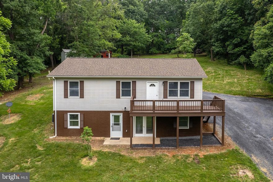 Ready for summer living in this updated rancher on 1.75 acres.  Fresh paint, modern fixtures/hardware, new appliances, and a slew of simple surprises like shed, deck, cement patio, private yard and walkout finished basement with full bath.  Come see today!