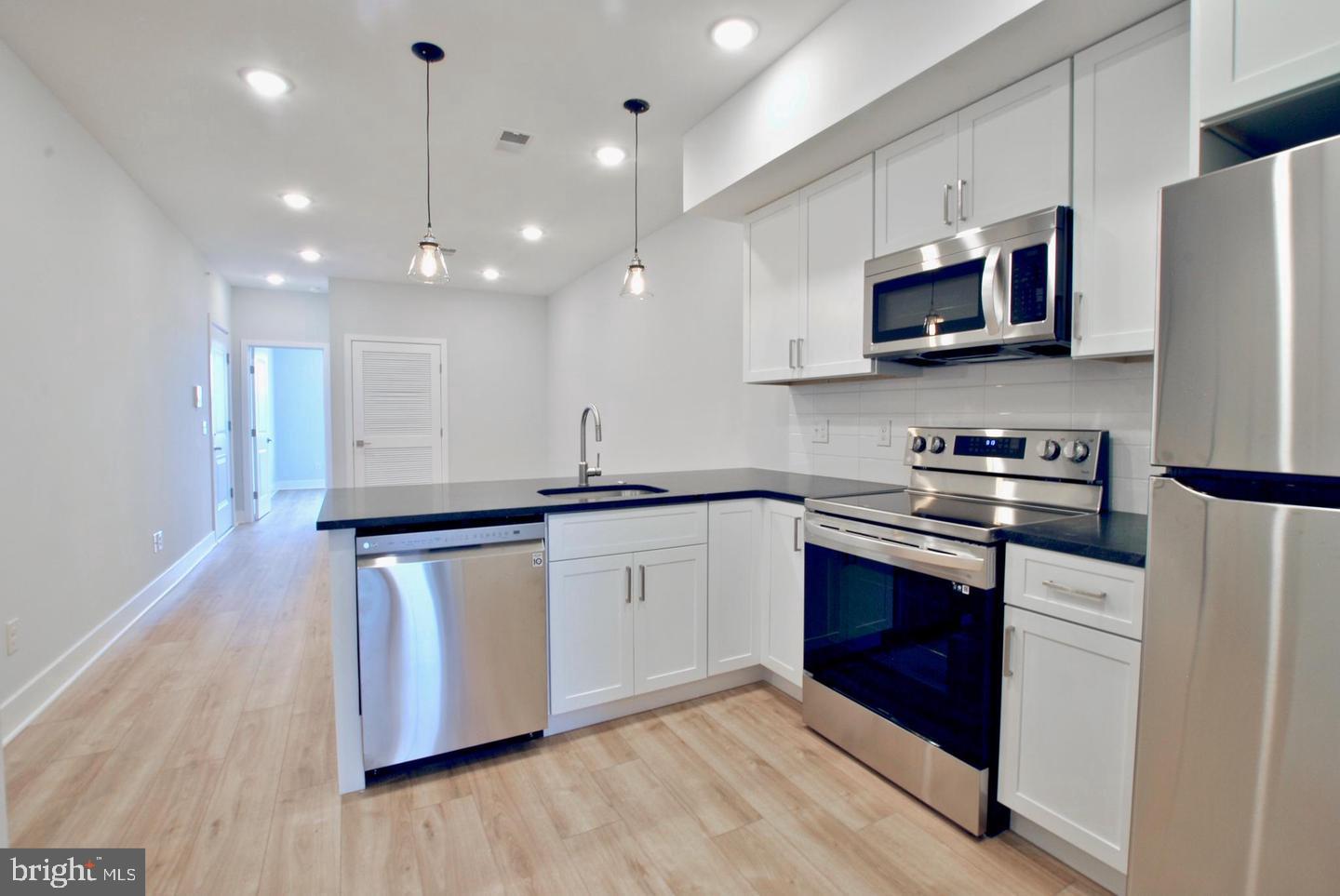 New construction 2bd/2ba apartment available in Norris Square for Sept 1st move in. The apartment features a huge roof deck with center city skyline views, high ceilings, wide plank hardwood flooring, large windows, video intercom. The modern kitchen has white cabinets, granite countertops with natural veining, subway tile backsplash, stainless steel appliances - including a
washer/dryer in unit. There is energy efficient central heating/cooling, LED recessed lights throughout, custom metal railings. The primary bedroom has a large closet and ensuite bathroom with glass shower and porcelain marble tile. The second bedroom is spacious with plenty of natural light and there is a second full bathroom off of the main living area. The Neighborhood: Convenient location on N 2 nd St only a few blocks from Fishtown and Northern Liberties, one block from Norris Square Park, 2 blocks to the Market-Frankford Line, restaurants/bars everywhere and surrounded by new construction projects. Hop on I95 within a few blocks for quick highway access. Call agent to review required tenant criteria before showings will be confirmed including credit score, background check, income verification, etc.
Tenant responsible for PECO, PGW and Water. No Pets.
Requirements: Applicants to make 3x the monthly rent in verifiable net income, credit history to be considered, no evictions within the past 4 years, and must have a verifiable rental history with on-time rental payments