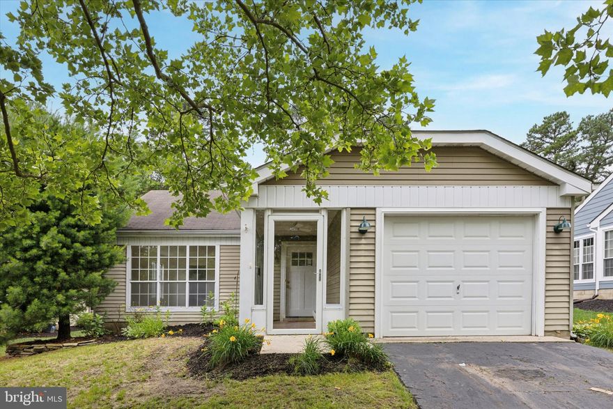 Welcome home to this tastefully renovated ranch in the active and friendly Leisuretowne community.  Recessed lighting and abundant natural light make for a bright open concept living space. In the kitchen you'll find premium cabinetry with soft close cabinets, all new stainless steel appliances, and quartz countertops. The nicely sized primary bedroom includes a beautiful ensuite bathroom for your convenience. The attached garage provides ample space for parking and storage. Community amenities include a fitness center, pool, tennis courts, and club house.  Schedule a showing today and come see for yourself.