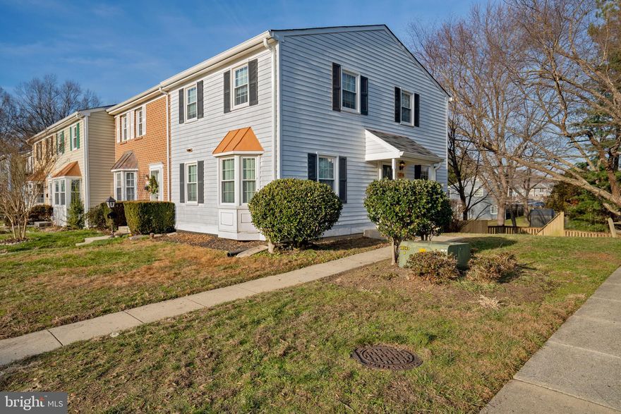 Gorgeous end-unit townhome, completely upgraded throughout and ready for immediate occupancy! Open kitchen with quarts countertops and stainless steel appliances, hardwood floors throughout main level, lower level family room with walk-out to fenced backyard, additional room in basement for office or possible 4th bedroom, upper level features a master bedroom with upgraded full private bath and two additional bedrooms, ceiling fans in each bedroom. Completely upgraded throughout! Excellent location with a massive amount of shopping and restaurants as well as quick access to commuter routes! Welcome home!