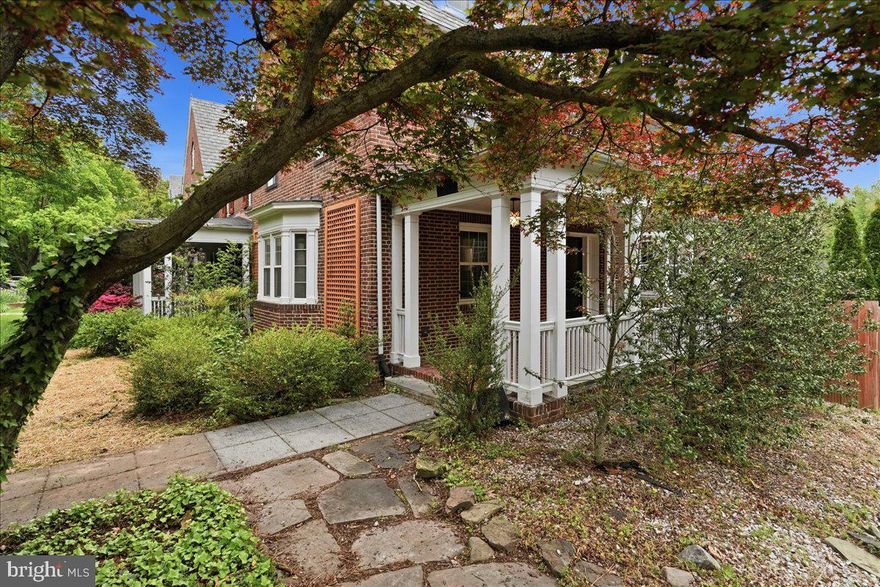 Large 4 Level Solid Brick Rowhome Featuring a Walk Out Basement and Spacious Bedrooms Throughout. Beautiful Hardwood Floors add Timeless Charm, while the Expansive Kitchen offers Stainless Steel Appliances, GRANITE Counters, and a Tile Backsplash. Enjoy Cozy Evenings by the Fireplace and Natural Light from the Skylight. Relax on the Covered Front Porch or Entertain in the Fenced Backyard Complete with a Large Parking Pad. Property Needs Updating and Cosmetic Improvements, Offering a Fantastic Opportunity to Add Value and Make It Your Own! Sold As-Is.