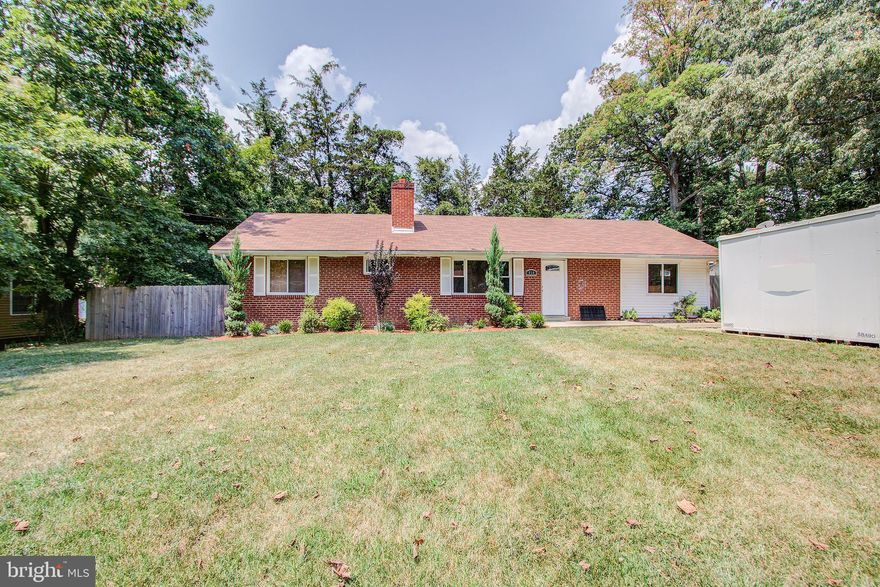 You do not want to miss out on this lovely house. Features hardwood flooring on main with a living room, another big room that can be used as study, playroom, second living room or 5th bedroom. Basement has a full bathroom with a bedroom, newer kitchen with granite counter tops and stainless steel appliances. Priced about $35k below market price for a quick sale.