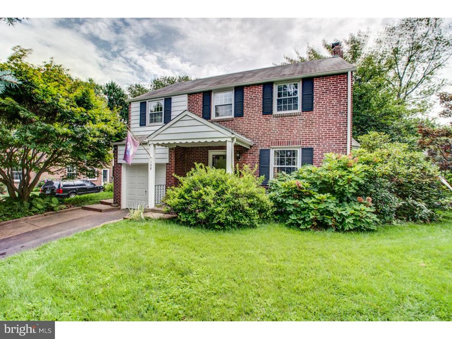 Come See this Solid Brick Single Colonial on a Lovely Lot. Enter off the front porch in to the Charming living room with handsome stair case, beautiful bay window and hardwood floors. The dining room is the perfect spot for family meals or holiday dinners. The recently updated kitchen is a great size with brand new stainless appliances. There is a great rec room in the finished part of the basement and plenty of storage. Upstairs there are Four bedrooms with hardwood floors, ample closets (the main bedroom has it's own built in antique wardrobe) and newer windows( great cross ventilation when you don't need the central air)in all the bedrooms. Out side the lush yard with mature plantings,compost area and delightful back porch is a gardeners delight. Come enjoy the parks, walking trails, jogging tracks, pools, libraries and schools of Cheltenham Township. Easy Access to major Universities and Hospitals, easy commute to Center City or the Northern Suburbs. A beautiful house that you will want to call HOME!