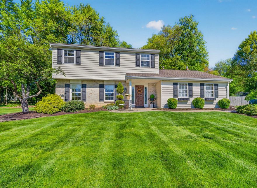 Meticulously maintained and fully updated, this exceptional move-in ready home is tucked within the desirable Oak Wood East neighborhood in North Penn School District. Offering 4 bedrooms and 2.5 baths, this home showcases timeless finishes including hardwood flooring throughout the first floor, staircase and upstairs hall, and quality craftsmanship throughout. The bright white kitchen features stainless steel appliances and opens to the inviting family room with a cozy gas fireplace, which then flows seamlessly into the cheerful sunroom filled with natural light — the perfect place to enjoy your morning coffee. Extensive custom millwork adds character and functionality throughout, including thoughtfully designed hidden storage solutions. Outside, enjoy professionally landscaped grounds with mature plantings, creating beautiful curb appeal and a peaceful setting. The private backyard is lined with mature trees and features a paver patio with a retractable awning, ideal for outdoor gatherings or relaxing evenings at home. A side-entry 1-car garage enhances the home’s curb appeal while adding convenience. Conveniently located just minutes from Wegmans, Costco, Trader Joes, major commuter routes including Routes 309 and 202, and numerous parks, shopping, and dining options.