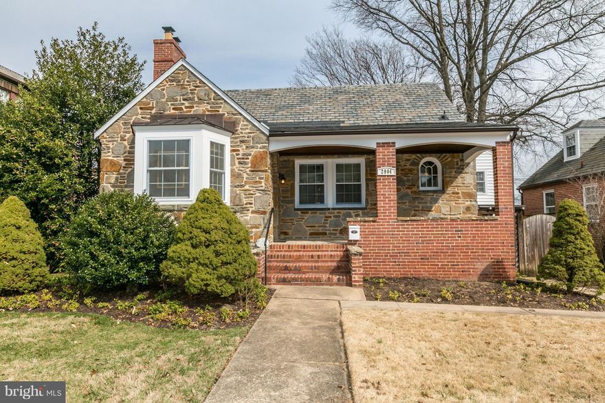 NICELY UPDATED STONE CAPE COD W COVERED FRONT PORCH ON CHARMING PARKVILLE STREET BOASTS GLEAMING REF WD FLRS & RENOVATED KITCHEN & FULL BATH! BRIGHT, OPEN LR W FP & BAY WINDOW SEAT. FRENCH DRS LEADS TO COVERED DECK & FENCED BACKYARD W PATIO. OPEN 3RD FLR MASTER BR. CLUB RM & STORAGE/UTILITY RM W TONS OF STORAGE. REAR DET GARAGE. ALL NEW WINDOWS, NEW TANKLESS WATER HEATER & EFFICIENT RADIATOR HEAT!