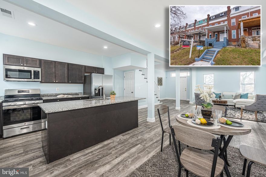 BEYOND SPECTACULAR 21 FT WIDE RENOVATION WITH 4 FINISHED LEVELS OF LIVING SPACE!  Open floor plan featuring wood floors throughout, an inviting living room with an electric fireplace, island kitchen with granite counters & ss appliances, 2nd level Primary suite with a full bath and additional 2 bedrooms with a hall bath, 2nd Primary suite on the finished 3rd level, finished basement with a large family room and 4th full bath, and a rear fenced yard.  Location can't be beat - steps from Mondawmin Mall and Druid Hill Park.