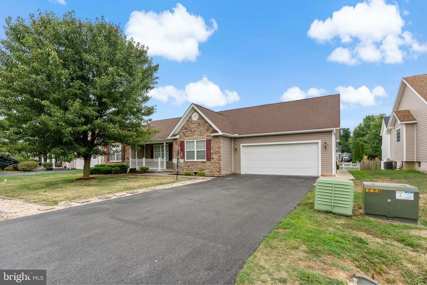 Welcome home to this charming stone and vinyl rancher nestled in a serene neighborhood. This one-level residence offers convenience and comfort with 3 bedrooms and 2 full baths. Step inside to discover beautiful hardwood flooring throughout, creating a warm and inviting atmosphere.
The heart of the home features a spacious living area perfect for gatherings, while the well-appointed kitchen boasts ample cabinet space .  Enjoy seamless indoor-outdoor living with a rear patio overlooking a fenced yard, ideal for relaxing or entertaining.
Additional highlights include a convenient rear storage building and a two-car garage providing plenty of storage space. Located in a desirable area, this home combines practicality with style, making it a must-see!