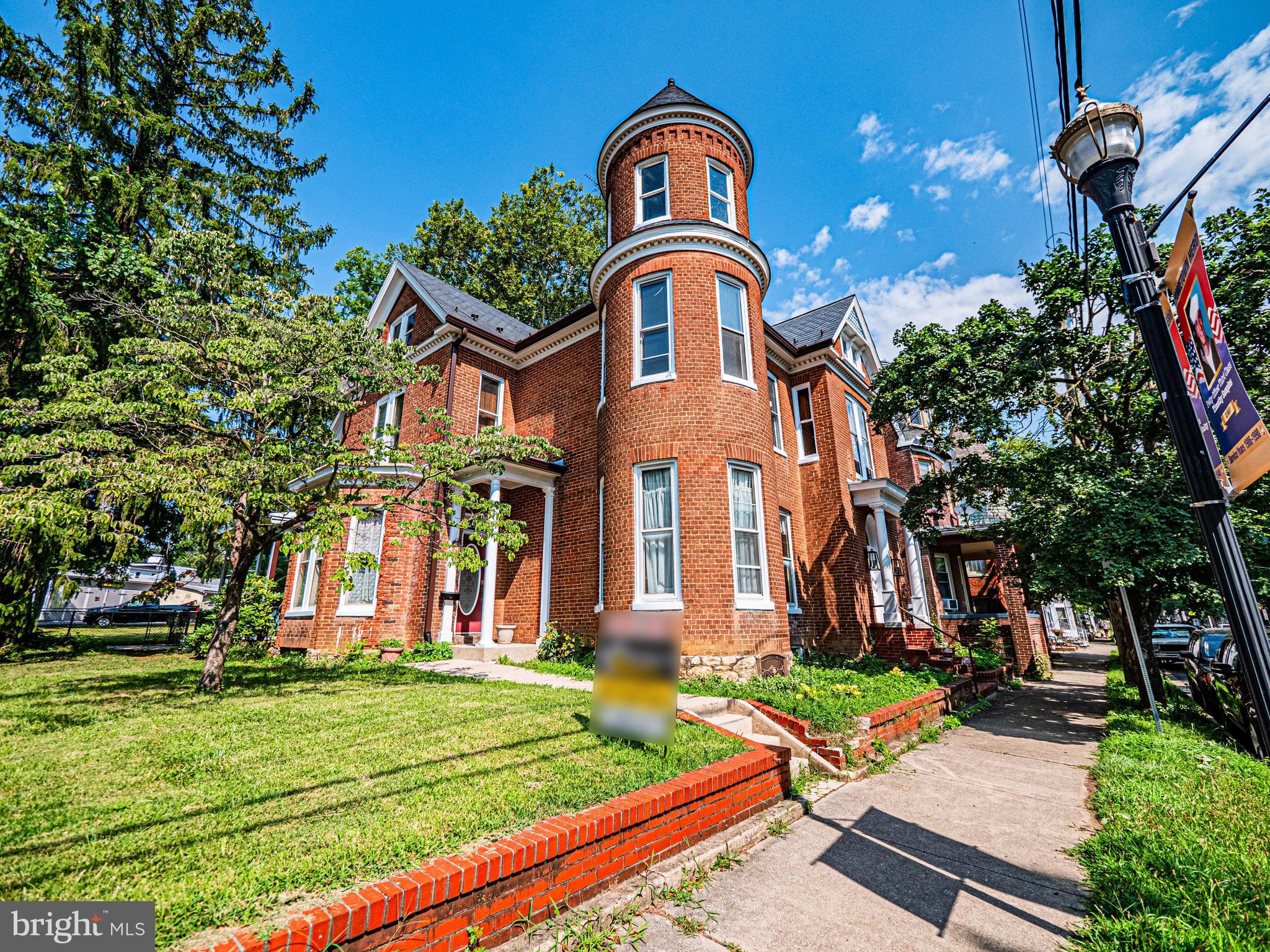 Charming 4 Bedroom/4 Full Bathroom Home – Full of Original Character
Located directly on multiple parade routes—this home offers a front-row seat to the local Memorial Day and Miracle on Main Street parades.
Welcome to 55 Pennsylvania Avenue, a unique 1880-built home, brimming with original character and rich architectural detail.
Begin your tour in the charming vestibule at the main front entrance—a warm and welcoming space that sets the tone for the craftsmanship found throughout the home.
From the moment you enter the Foyer, you’ll be enchanted by the 10' ceilings, and intricate woodwork, especially on the staircase. The main floor offers one full bathroom and an abundance of gracious living space. This home features a Formal Living Room with a gas fireplace, a spacious 25 x 15 Family Room, a light-filled Sunroom with Window walls, and additional versatile rooms perfect for entertaining, working, or relaxing. Original pocket doors and generously sized rooms add both function and elegance throughout.
Upstairs, you'll find four spacious bedrooms and two full bathrooms.
One of the bedrooms features an en suite bathroom, while a second full bath is conveniently located in the hallway. You will appreciate the preservation of historic features like original hardware, transom windows, and striking wood doors. A thoughtfully placed second kitchen and laundry area provide added convenience—perfect for extended family, guests, or potential rental opportunities.
The full walk-up attic is expansive, offering endless possibilities for a studio, office, or future finished living space.
Bring your vision to the lower level, where you'll find a third full kitchen, recreation room, and another full bathroom. There is ductwork in place for A/C (the system will need servicing). A separate laundry hookup offers additional flexibility. Exit from basement is Bilco Doors.
In the Rear Fenced yard, there is a peaceful koi pond (currently unstocked) and mature landscaping.
Recently updated electrical systems offer peace of mind, while maintaining the home's historic integrity.
-This home has many ways to enter. The most convenient being through the Rear Entry into the main kitchen- Homeowner never uses the front door on Penn Avenue to enter or exit.
Lockbox is on the back door. From Main Street turn onto Maryland Avenue and park on property behind the back fence line next to garage. OR on Parking Pad next to the house. Go through the any gate to Back Door.