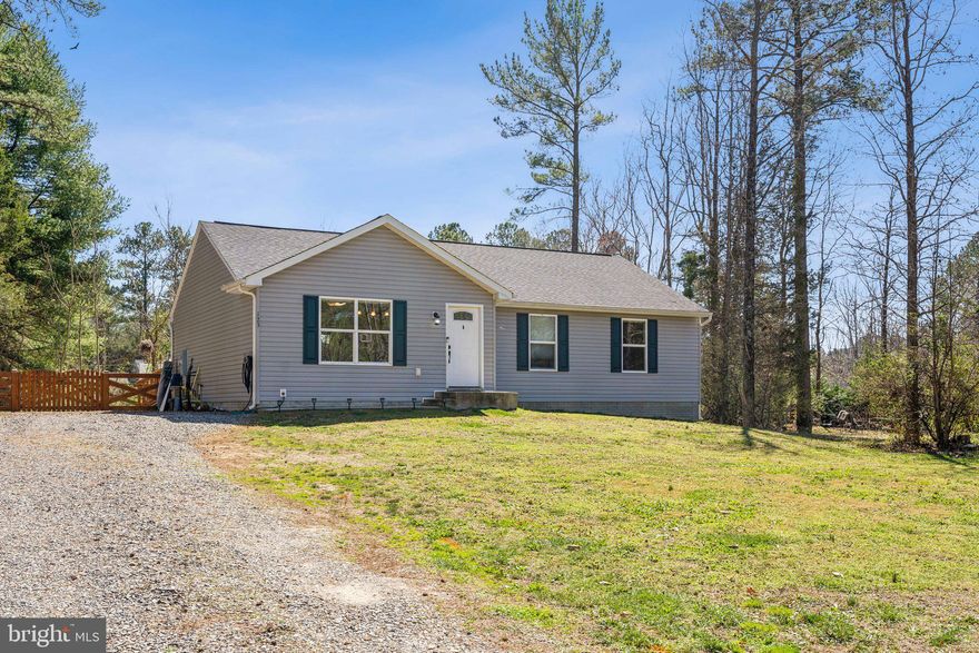 Back on the market at no fault of the seller!! Don't miss this opportunity to own a great home!

This stunning 3-bedroom, 2-bath home offers over 1,300 sq. ft. of bright, open living space on just over a quarter acre. The spacious floor plan is filled with natural light, showcasing an upgraded kitchen with granite countertops, stainless steel appliances, and soft-close cabinets. Fresh paint (2022) adds a modern touch throughout, except for the cozy baby’s room. Additional features include a smart thermostat and a large insulated crawl space for extra storage. The expansive fenced backyard (installed in 2023, $7K) is perfect for pets and outdoor enjoyment. Ideally located near Little Beach Park, residents can enjoy swimming, relaxation, and the best of lakeside living!

Lake Caroline is a gated community in Ruther Glen, VA, featuring over 1,000 homes nestled around a pristine 277-acre lake. With 10 miles of tree-lined shoreline, the lake offers swimming, boating, and fishing, fed by natural springs and Stevens Mill Run. Residents enjoy year-round amenities, including a pool, tennis and pickleball courts, a clubhouse, two beaches, multiple recreation areas, and 24/7 security.