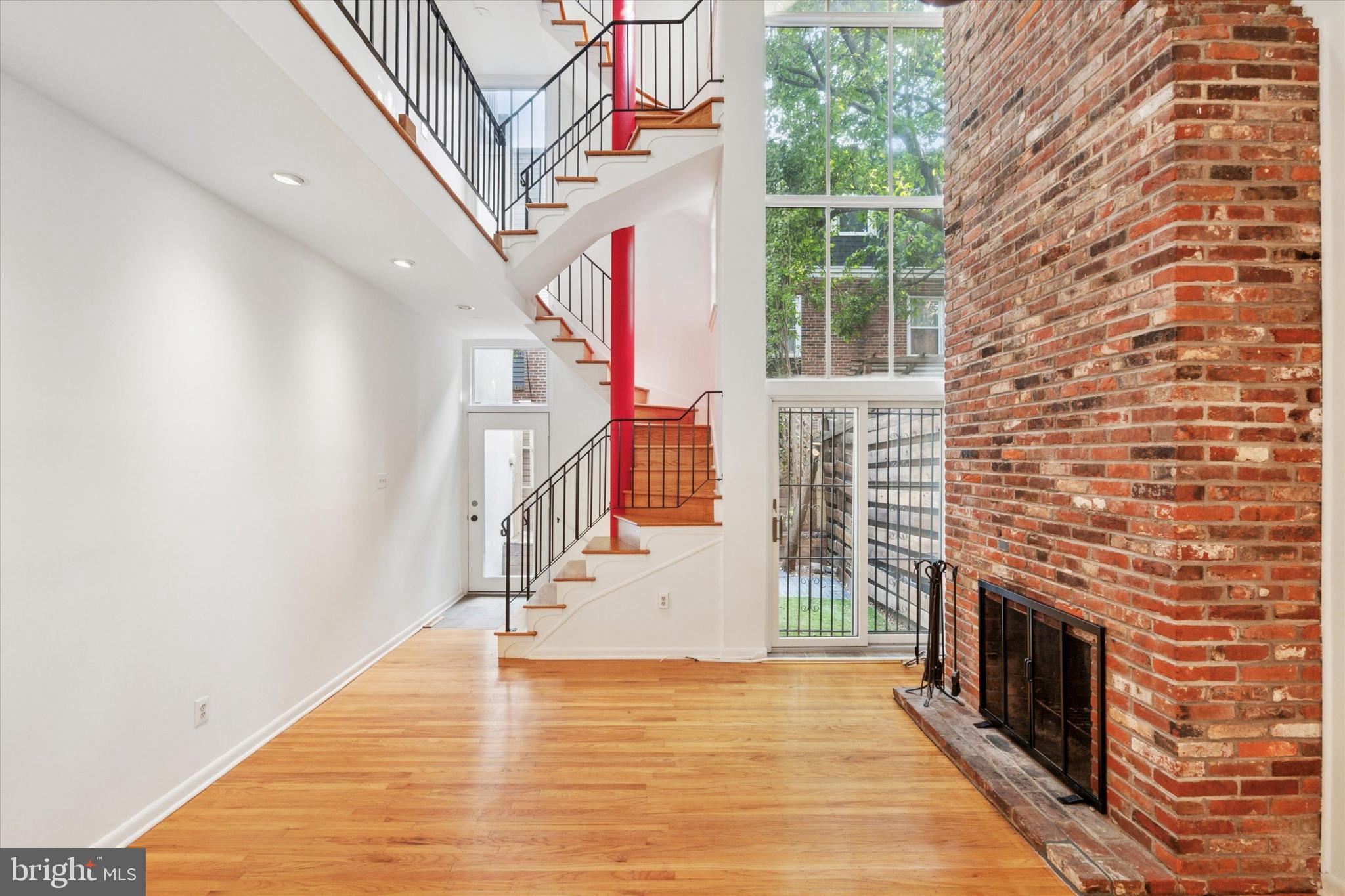 Impeccably maintained and filled with natural light, this sun-drenched home is tucked away on a quiet, tree-lined block in the heart of Washington Square West. As you enter, you’ll be welcomed by soaring ceilings, dramatic south-facing multi-tiered windows, and an open, airy staircase that brings light and volume throughout the space.
The first floor features a fully open living and dining area—perfect for everyday living and entertaining—complete with a wood-burning fireplace, a stylishly renovated kitchen, and a convenient powder room. This level also includes access to a large private outdoor space—a rare find in the neighborhood, perfect for relaxing or entertaining.
Upstairs, the second floor offers a spacious primary suite with excellent closet space and a newly renovated bathroom featuring double sinks and a luxurious overhead rain shower. The third floor includes two more generously sized bedrooms and another recently updated full bath.
The finished basement adds valuable flexible space, along with a full bathroom and a laundry area with washer and dryer. Plus, there’s over 500 square feet of attic storage to help keep everything organized.
All this is just steps from Washington Square Park, Whole Foods, Jefferson Hospital, Pennsylvania Hospital, and endless restaurants and shops along 13th Street. A truly special home in one of Center City’s most walkable and vibrant neighborhoods.