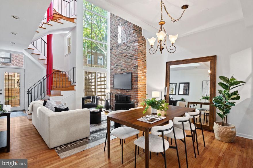 Impeccably maintained and filled with natural light, this sun-drenched home is tucked away on a quiet, tree-lined block in the heart of Washington Square West. As you enter, you’ll be welcomed by soaring ceilings, dramatic south-facing multi-tiered windows, and an open, airy staircase that brings light and volume throughout the space.

The first floor features a fully open living and dining area—perfect for everyday living and entertaining—complete with a wood-burning fireplace, a stylishly renovated kitchen, and a convenient powder room. This level also includes access to a large private outdoor space—a rare find in the neighborhood, perfect for relaxing or entertaining.

Upstairs, the second floor offers a spacious primary suite with excellent closet space and a newly renovated bathroom featuring double sinks and a luxurious overhead rain shower. The third floor includes two more generously sized bedrooms and another recently updated full bath.

The finished basement adds valuable flexible space, along with a full bathroom and a laundry area with washer and dryer. Plus, there’s over 500 square feet of attic storage to help keep everything organized.

All this is just steps from Washington Square Park, Whole Foods, Jefferson Hospital, Pennsylvania Hospital, and endless restaurants and shops along 13th Street. A truly special home in one of Center City’s most walkable and vibrant neighborhoods.