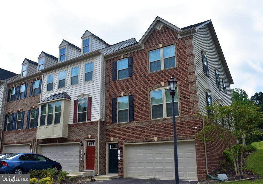 Welcome to this lovely brick front end unit TH built in 2017. Actual builder MODEL HOME for IMMEDIATE MOVE IN!Spacious Home with attached 2-Car Garage and Backyard with Brick Patio!Many Kitchen upgrades including esspresso kitchen cabinetry,granite countertops, stainless steel appliances, and large kitchen island.Hardwood flooring throughout., finished basement with fireplace andcustom paint. The owner s suite features a walk-in closet, soaking tub and separate shower with double vanity.The walk-out lower level includes a recreation room and sitting area perfect for home office. Fantastic location near FDA, shops and restaurants, and close to the ICC/200 with easy access to I95 and I270.