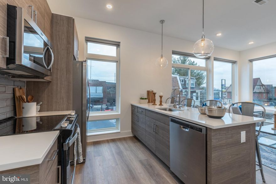 *Available Now!*

Welcome to The Nook! This modern apartment community is located in Germantown, one of Philadelphia’s most historic neighborhoods that also allows for easy access to City Line Avenue, Manayunk/Roxborough, Kelly Drive, and Center City. This residential community comes equipped with smart home keyless entry systems, a fully furnished shared rooftop deck, as well as a fitness center that is equipped with top-of-the-line gym equipment. There is an on-site package center which will allow for simple order delivery and return services, as well as limited off street garage parking available to residents. This 2 bed, 2 bath apartment features 12 foot ceilings and is equipped with a breakfast bar with sleek white countertops, modern shaker cabinetry, high end Whirlpool stainless appliances, custom California styled built out closets, and tons of natural lighting from the massive windows throughout. Additional amenities include a private balcony, central AC as well as in-unit laundry.

*Leasing Special: 1 Month Free on a 13 Month Lease! 
*Limited garage parking is available for an additional $150/mo fee.
*Pets permitted with owner approval. $200 non-refundable fee and $25/mo rent per pet required.
*Photos of a similar unit in the building.