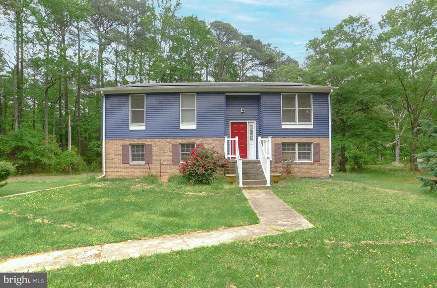 SO MANY OPPORTUNITIES HERE.  ALMOST 2 1/2 ACRES WITH NO HOA AND WATER VIEWS!  SPLIT FOYER WITH 3 BEDROOM AND 1 FULL BATH.  UNFINISHED WALKOUT BASEMENT HAS LAUNDRY AND ROUGH-IN FOR 2ND FULL BATH.  BRING YOUR IMAGINATION.  DETACHED GARAGE/WORKSHOP AND PLENTY OF ROOM FOR ALL "THE THINGS"  VA ASSUMABLE MORTGAGE 2.1% INTEREST RATE...