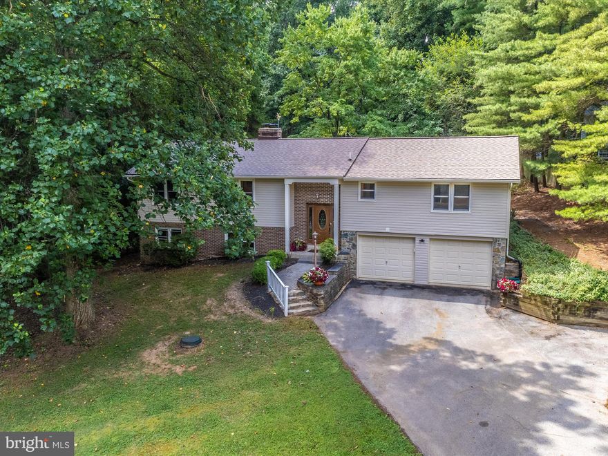 Welcome to the comfort and tranquility of Monrovia, MD. The setting of 11807 Pine Tree Court embodies a true sense of “home". Tastefully placed on a quiet cul-de-sac in an established neighborhood, this home is perfectly suited for families of all kinds - simple homebodies, active outdoor enthusiasts, frequent holiday hosts, and everything in-between. 

The main level boasts an expansive open concept layout, incorporating dual living areas that cater effortlessly to your entertaining desires - perfect for a larger family or the exemplary host. The thoughtful arrangement of spaces ensures that the three main level bedrooms remain secluded from the living areas, granting a sense of privacy. These bedrooms are complemented by two full bathrooms and a conveniently placed laundry area also on the main level. An elegantly updated kitchen is centrally located, featuring custom tasteful cabinetry, under-cabinet lighting, and harmonious tile floors that flow seamlessly with the granite countertops. The kitchen effortlessly extends into a bar-height eat-in section that overlooks both the dining area and the great room, creating a perfect convergence of culinary activities and social interaction.

 Just a few steps to the lower level, you'll discover a vast and adaptable living space. A bonus room, artfully suited to function as a fourth bedroom, neighbors a full bathroom and a wet bar area that holds potential for easy conversion into a full kitchenette. The property's generously sized two-car garage is a true utility hub, offering ample space for a workbench as well as storage for yard equipment and various possessions. Embrace the luxury of living in a home that harmonizes convenience, privacy, and entertaining. 

Contact us today to secure your place in this relaxing community setting and make this distinctive Monrovia residence your own.