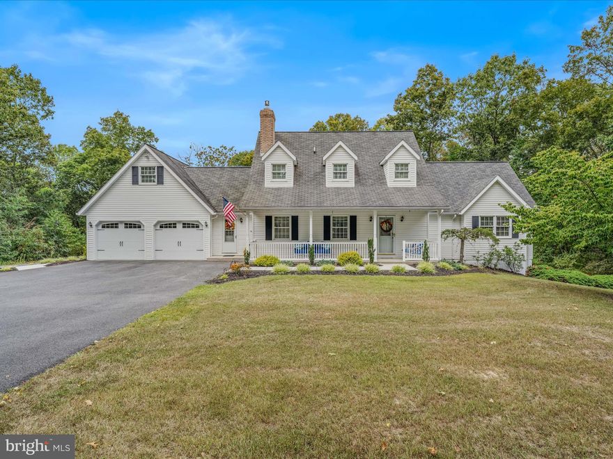 Location Location Location! A beautifully tree-lined driveway leads to this private custom-built Cape Cod.  The home features a breezeway with a half bath and laundry closet. The kitchen boasts granite countertops and new stainless steel appliances. The dining area features a patio door that opens onto the rear deck. The living room is complemented by a brick fireplace, built-in bookshelves and hardwood floor throughout the main level.  The main level primary bedroom, located just down the hall, features double walk-in closets, and a full bath. From the formal entry foyer, an open staircase leads to two bedrooms, a full bath, an office area, and a spacious room suitable for a hobby/sewing room, or perhaps additional sleeping area. Additional features include plenty of storage closets. The full unfinished basement features an automatic garage door and roughed-in plumbing for an additional bathroom if needed. The basement offers ample storage space and the potential for finishing to create extra living space. The covered front porch provides an ideal setting for relaxation. The attached two-car garage offers convenient parking.  A 30x40 Morton building, equipped with electricity and a water hydrant right outside the door, is perfect for hobbyists. Situated on 3.77 acres, the property is conveniently located near I-70, a hospital, and downtown Berkeley Springs. This location is ideal for everyone. Protective covenants apply.