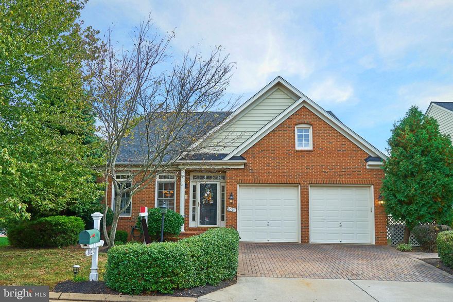 OPEN HOUSE CANCELLED. Ratified contract.   Gorgeous updated home with two story family room, formal living and dining rooms, crown molding, open floor plan, MN LVL MBR with stunning MBA and WIC w/closet organizer,  hardwood flooring, total of 5 BR, 3.5 BA, fully finished basement, built-ins located in 3 different rooms, large wet bar in basement, wine cellar, this place has it all!  Back yard fully fenced with brick patio, brick front driveway and sidewalk, two-car garge with crown molding (former model office) and freshly painted floors.  This home is stunning!!!  Kitchen has 42" maple cabinetry with backsplash, SS appliances, new gas cooktop, new quartz counters, double sink, new faucets throughout, a LOVELY HOME!!!