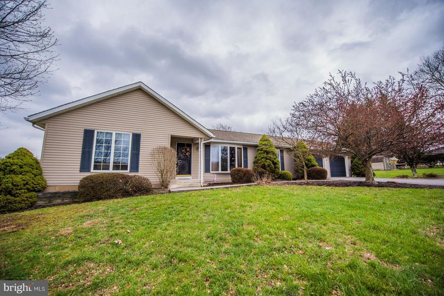 Located near the hospital & less than 3 miles from Berkeley Springs, this 3BR, 2BA rancher features a kitchen/dining combo as well as a formal dining room. Tastefully fin. basement with a large family room, exercise/office, 4th BR & 3rd BA + laundry area & laundry chute.  Mostly level yard, with fenced back yard, large concrete patio for summer barbeques, paved driveway and 2 car attached garage.