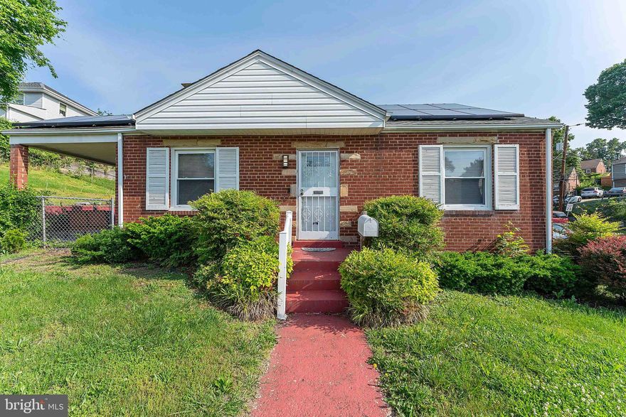 WELCOME HOME!! Come inside and tour this beautifully maintained single family home on a large corner lot with a fenced rear and covered patio great for hosting! Brand new roof with solar panels! This freshly painted home gleams of original hardwood flooring throughout the first level, which also includes the lovely living area, two nice sized bedrooms, a full bath, and kitchen with laundry units.  A second kitchen exists on the lower level with an  in-law suite w/ separate entrance in the carpeted basement, that also contains a full bathroom, a den area, as well as its’ own  Washer and Dryer that conveys. Easily rentable for the savvy investor. Well kept yard with private parking for two cars.  Shed for storage.  Minutes to downtown Washington, DC, Minutes to Census Bureau, Right off of Pennsylvania Ave.  Close proximity to Naylor Road and Capitol Heights metro , bus lines, etc. Great home at a great price!!