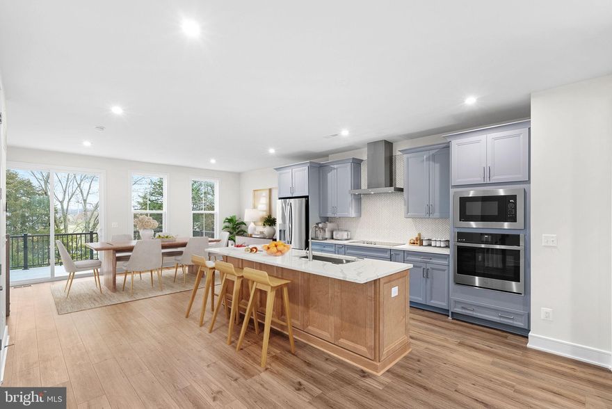 Brand New Luxury Townhome in Prosperity Plains – 4 BR, 3/2 BA, 2-Car Garage

Be the first to live in this stunning, never-before-occupied townhome by VanMetre Homes in the sought-after Prosperity Plains community! Boasting just under 2,800 sq ft of finished living space across four spacious levels, this home offers 4 bedrooms, 3 full baths, 2 half baths, and elegant modern finishes throughout.

Step inside to 9-foot ceilings, solid oak stairs, and luxury vinyl plank flooring that flows across the open-concept main level. The stylish kitchen is a true centerpiece, featuring upgraded cabinetry, quartz countertops, tile backsplash, stainless steel appliances, and an oversized island, perfect for cooking and entertaining.

Enjoy seamless indoor-outdoor living with a large rear deck and ground-level patio, ideal for relaxing or hosting guests. The upper level includes a luxurious primary suite with a walk-in closet and spa-style bath, plus two more bedrooms, a full bath, and laundry. The top-level loft adds flexibility with a private 4th bedroom and full bath, great for guests or an office. Downstairs, a large rec room, half bath, and access to the finished 2-car garage complete the space.

Community amenities include a pool, fitness center, clubhouse, tot lot, and scenic walking trails.

Perfectly located near Loudoun and Fairfax counties with easy access to shops, dining, and commuter routes, this home has it all.

Now available. Schedule your tour today!

*Photos are virtually staged. Home is not furnished.