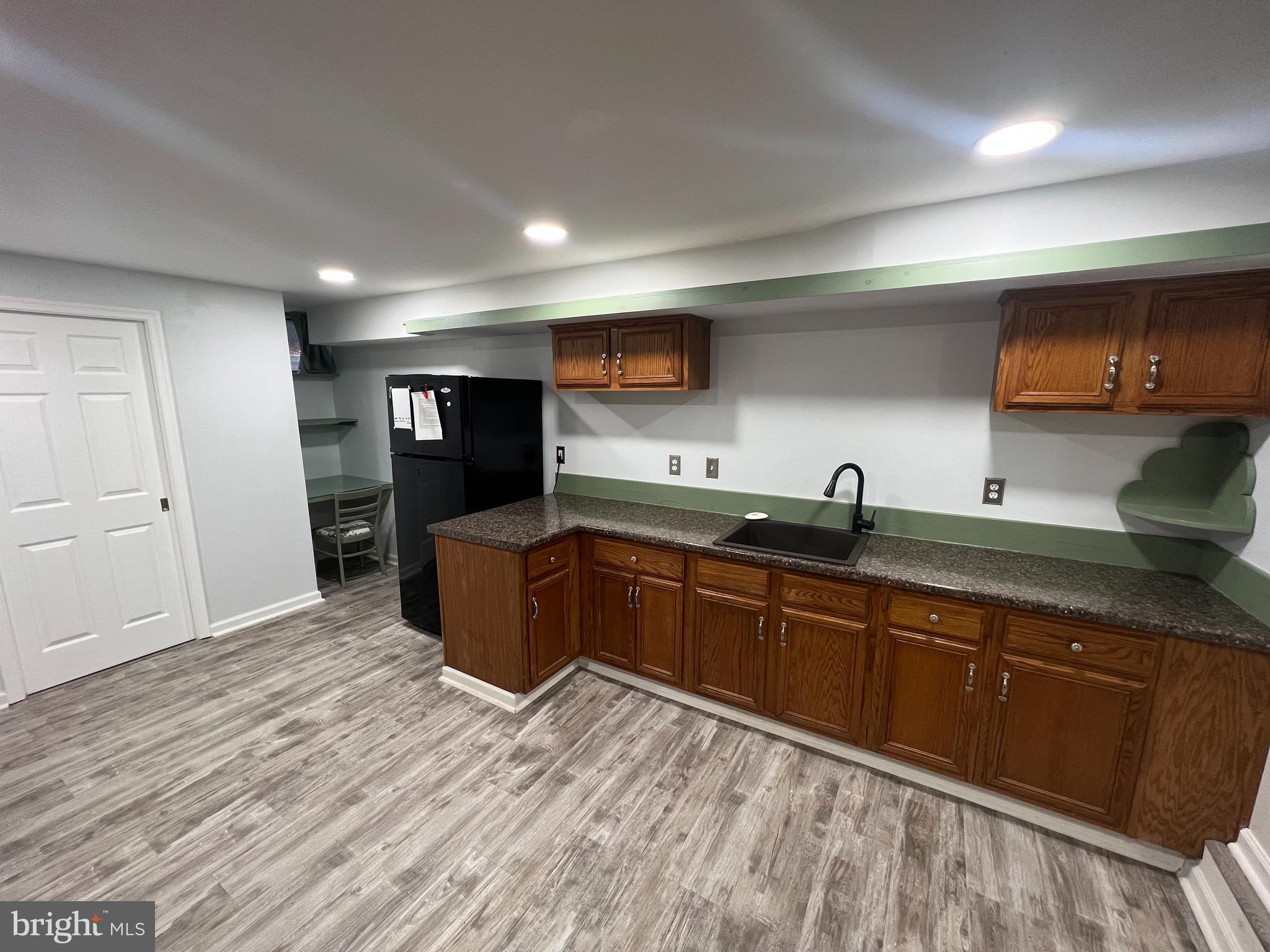 ALL UTILITIES INCLUDED! Don't miss out on this charming Frederick apartment in the highly desirable Spring Ridge community. This one-bedroom basement unit boasts a generous 900 square feet of space and offers a private entrance for your convenience. Inside, you'll find sleek vinyl plank flooring, a spacious kitchen, spacious custom closets, built-in shelves and desk, a brand new washer/dryer for added convenience, and an egress window for ample natural light. The bathroom has been recently renovated. Step outside to discover two brick patios and a lush backyard filled with trees, providing a tranquil and private outdoor space.
You'll be close to a wide array of amenities and services within the Spring Ridge community, ensuring your everyday needs are met. Rent covers electricity, gas, water, and internet.
Please note that pets and fish tanks are not permitted, and we kindly request the use of fragrance-free products to accommodate all residents. The house does not currently offer cable services. To apply, each adult applicant must complete a full application, undergo a credit check, and provide employment verification.
